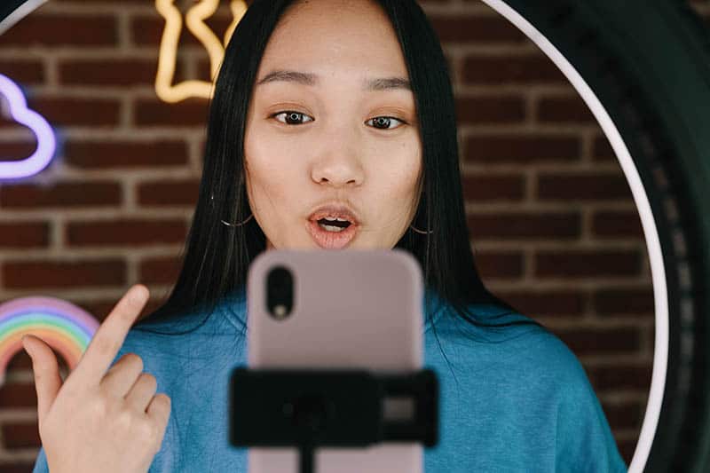 influencer with smartphone