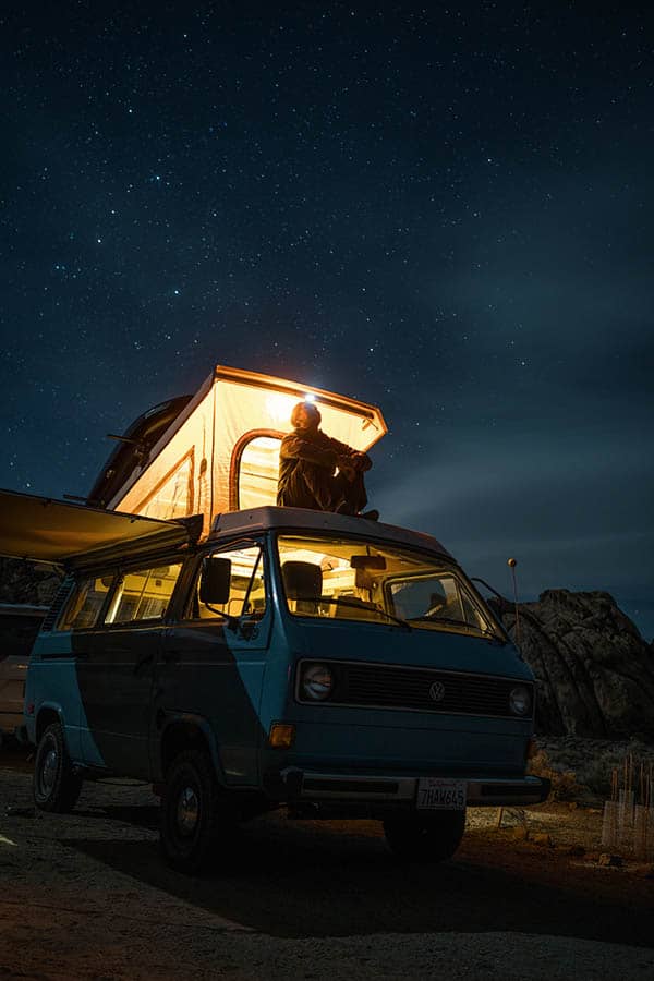 watching stars on top of van